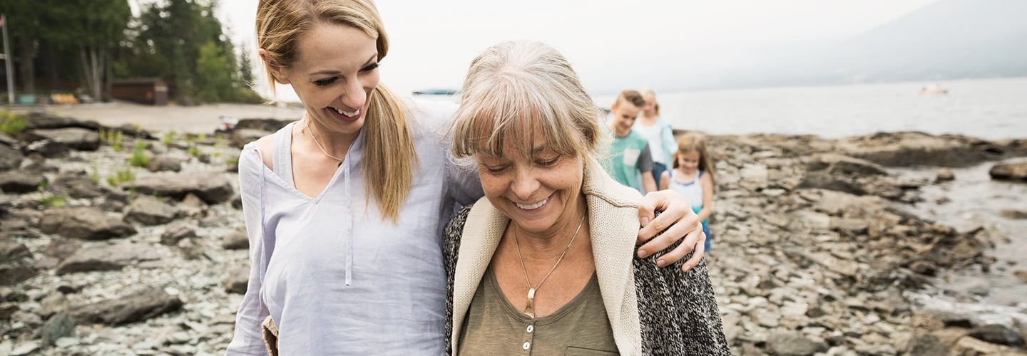 Two women walking on a beach