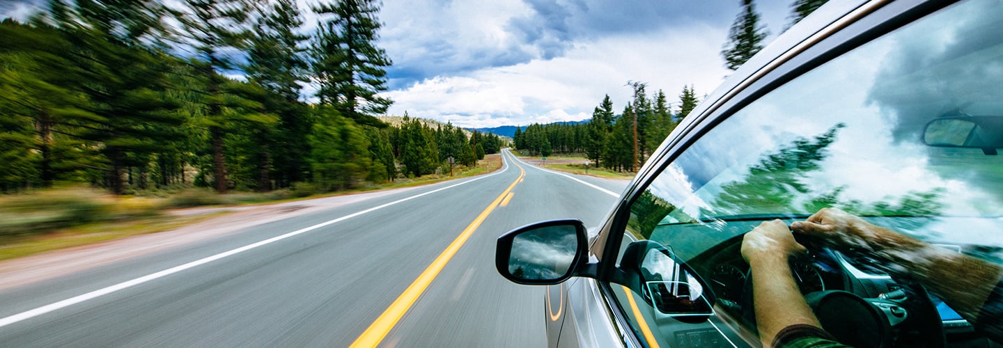 Photo of a car driving 