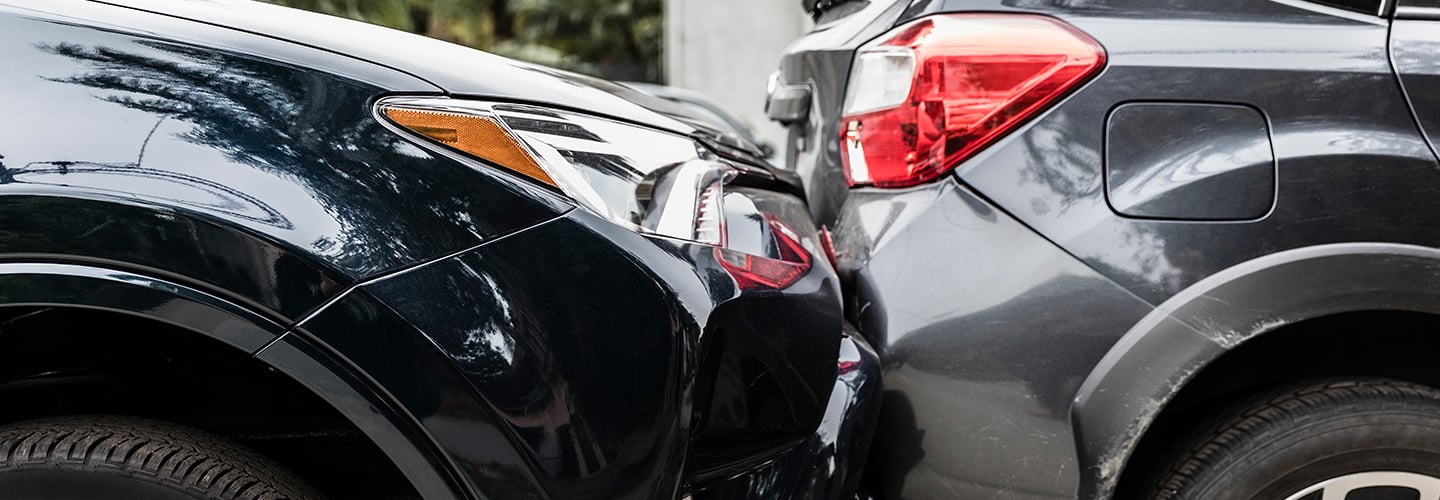 a car being rear ended by another car