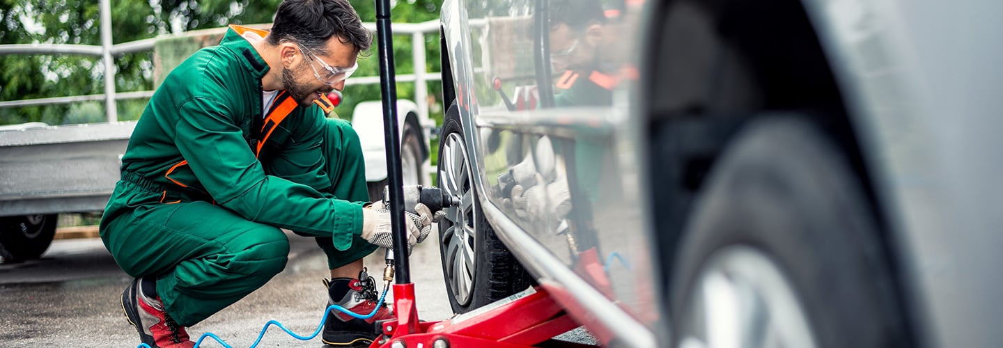 mechanic working on a car