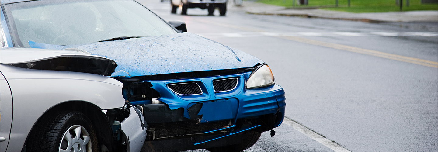 Two cars with damaged front bumpers after a collision