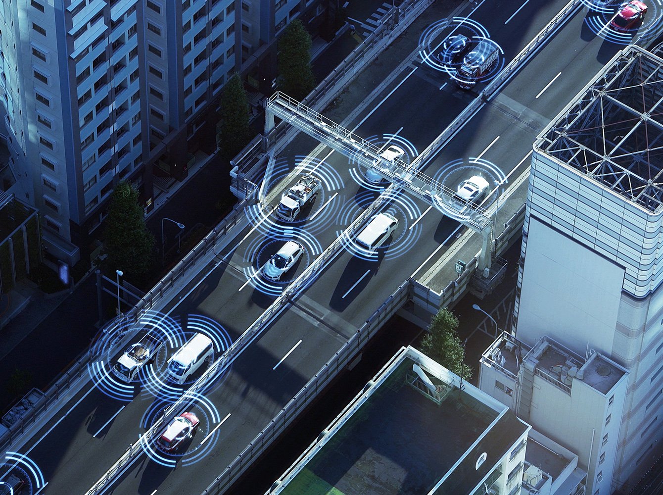 ariel view of smart cars driving on a highway in the city