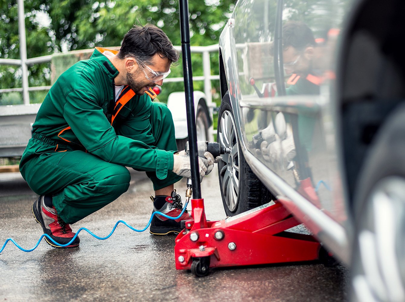 mechanic working on a car