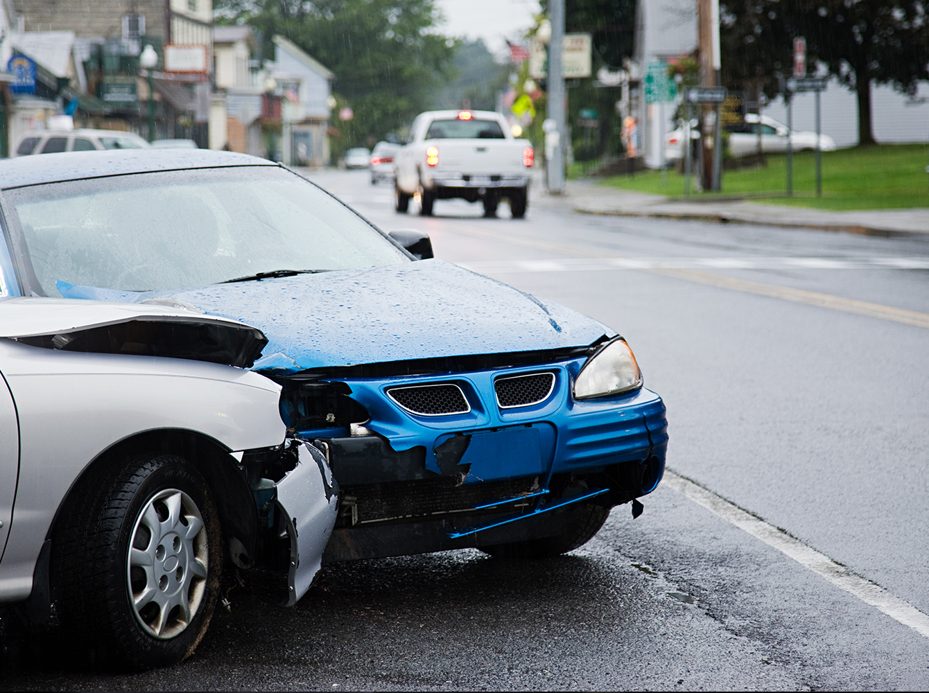 Two cars with damaged front bumpers after a collision