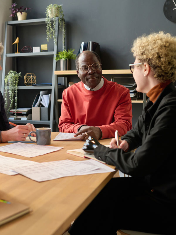Two people have a business meeting in a modern office