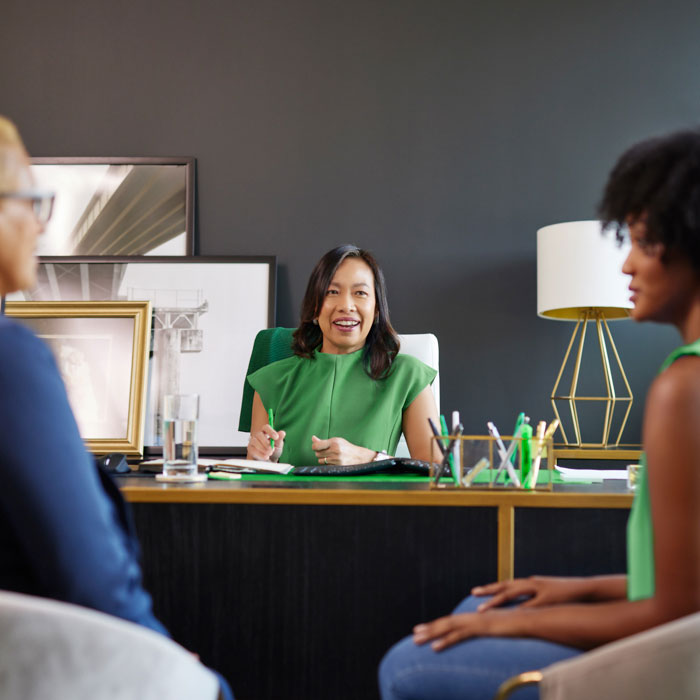 Three executives meeting