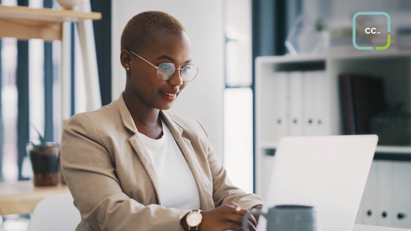 A woman working on a laptop