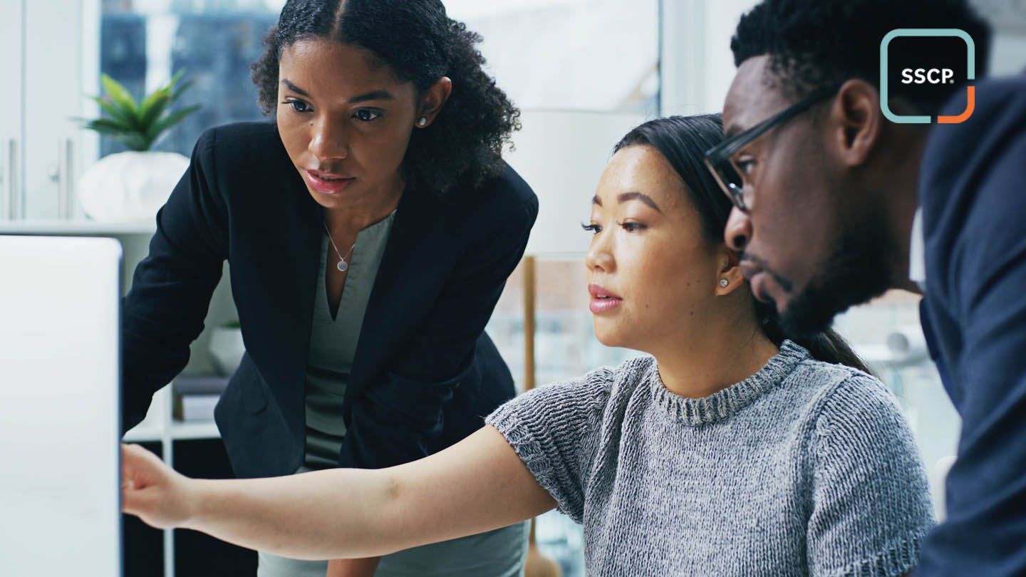 Three diverse people working together