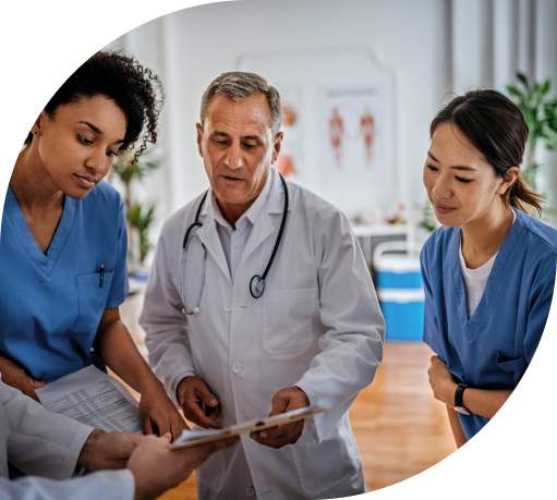 Doctor and nurses checking a patient's chart