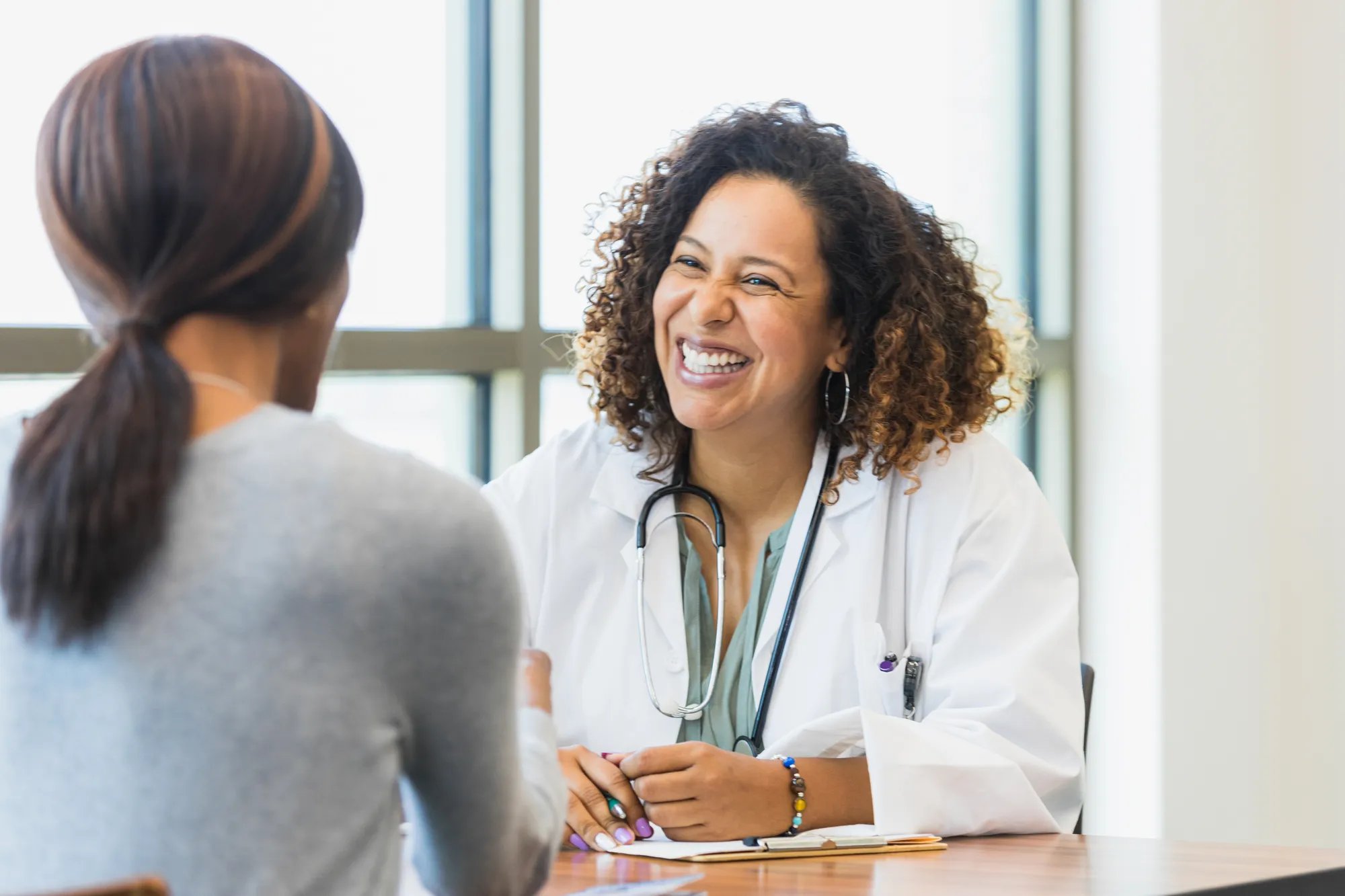 Doctor speaking to patient