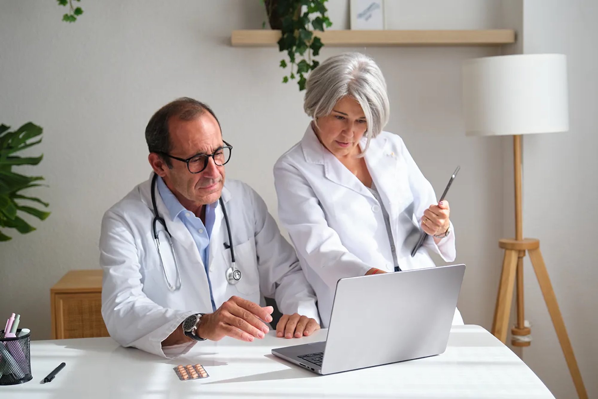 Two senior doctors having a serious discussion