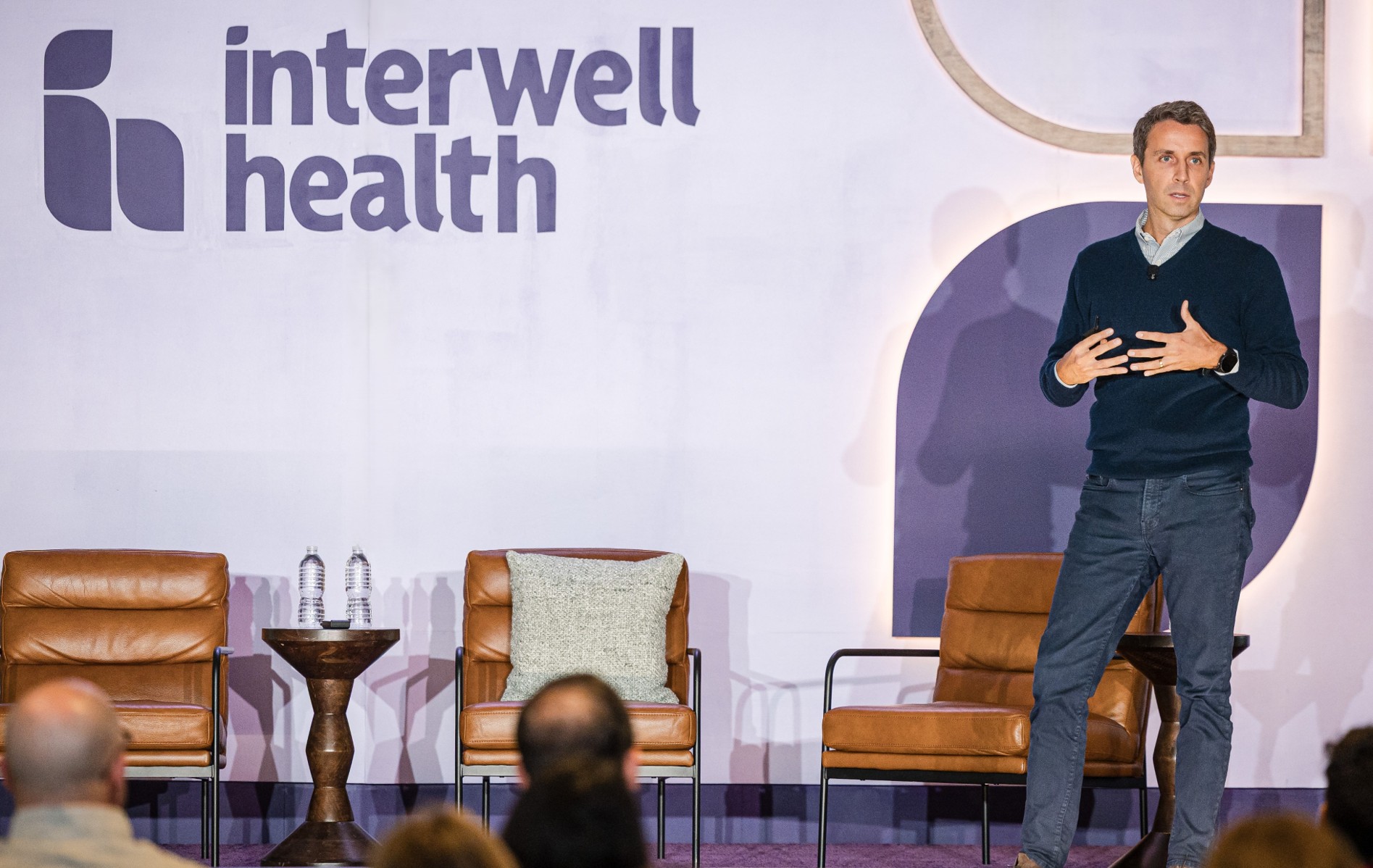 Interwell Health CEO Tommy O’Connor on stage at the 2025 Partner Summit