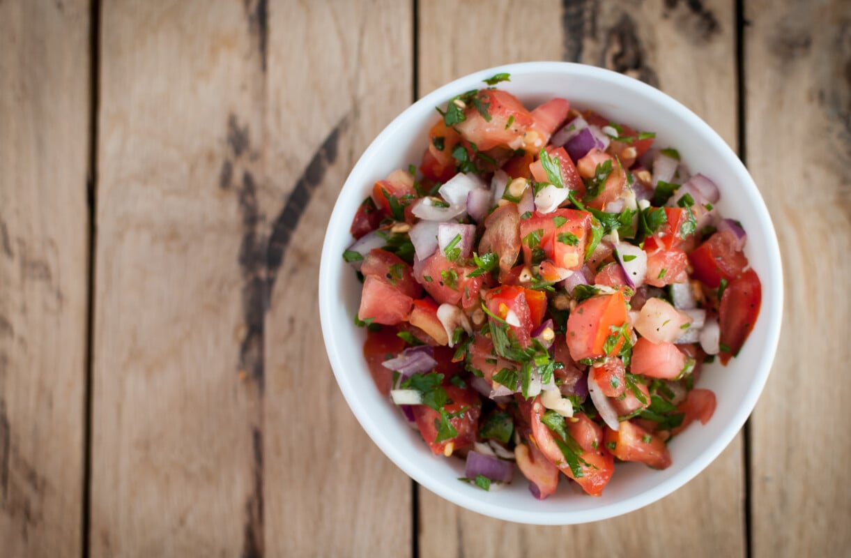 Salsa dip with fresh tomatoes, onions, garlic, parsley and lemon juice