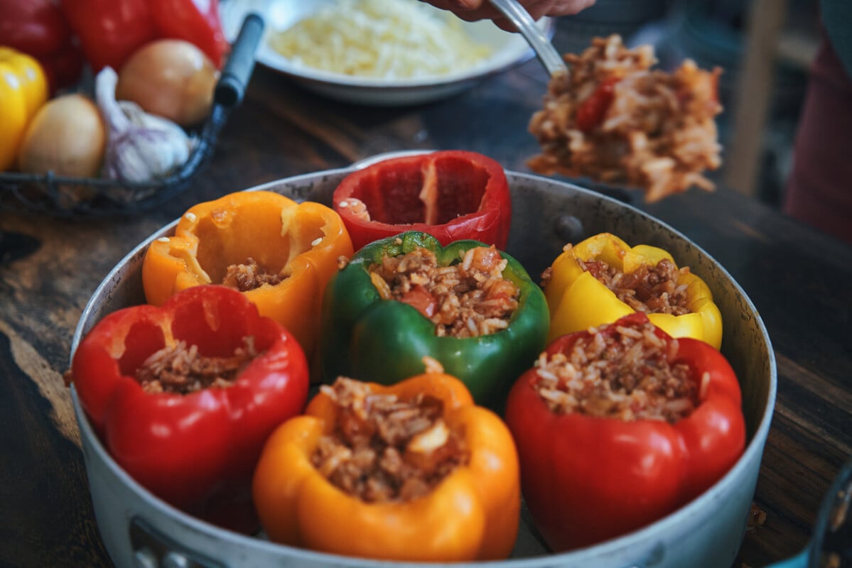 Preparing Stuffed Bell Peppers with Ground Meat in Tomato Sauce