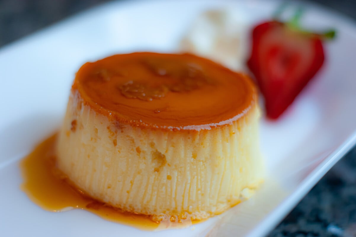 Flan de Queso, smooth cream cheese custard topped with a decadent layer of homemade caramel