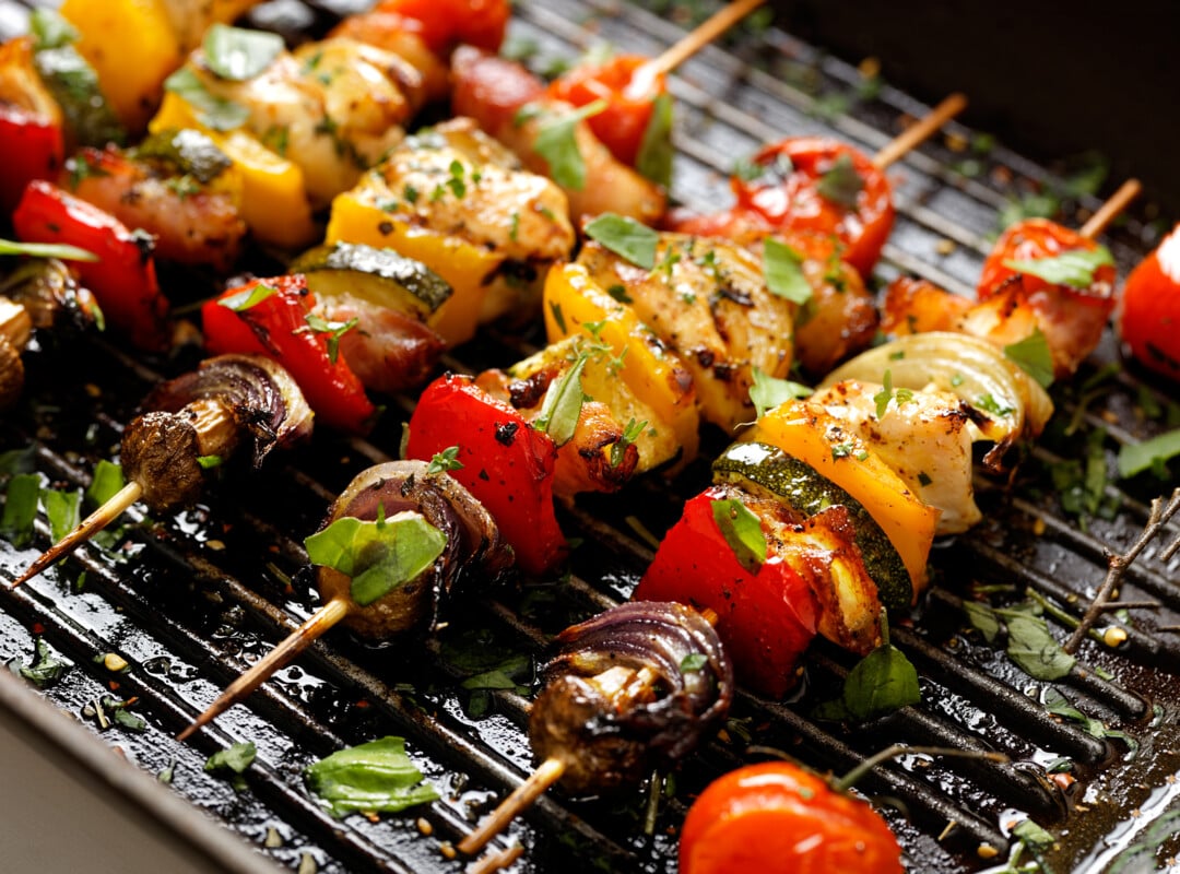 Grilled skewers of vegetables and various meats