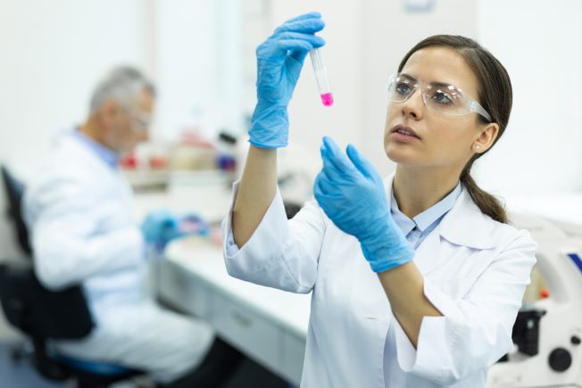 Female researcher in clinical lab