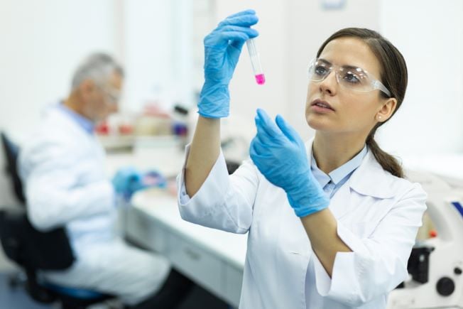 Female researcher in clinical lab
