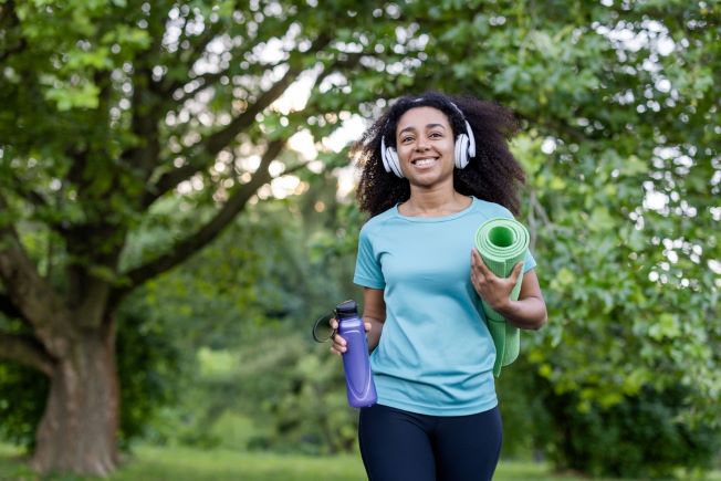 Young woman on walk in the park