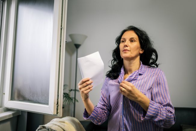 Woman having hot flash