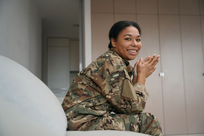 Female soldier sitting down