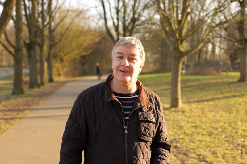 Man walking in the fall