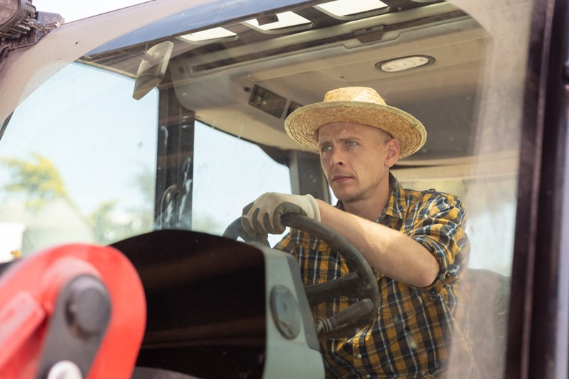 Farmer driving his tractor