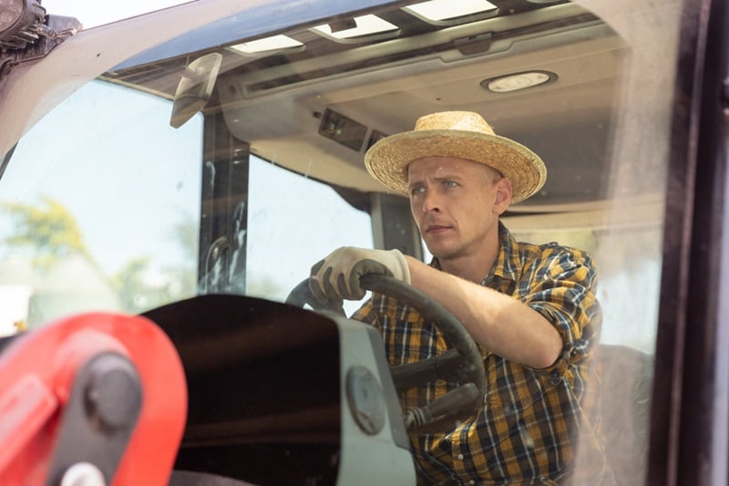 Farmer driving his tractor