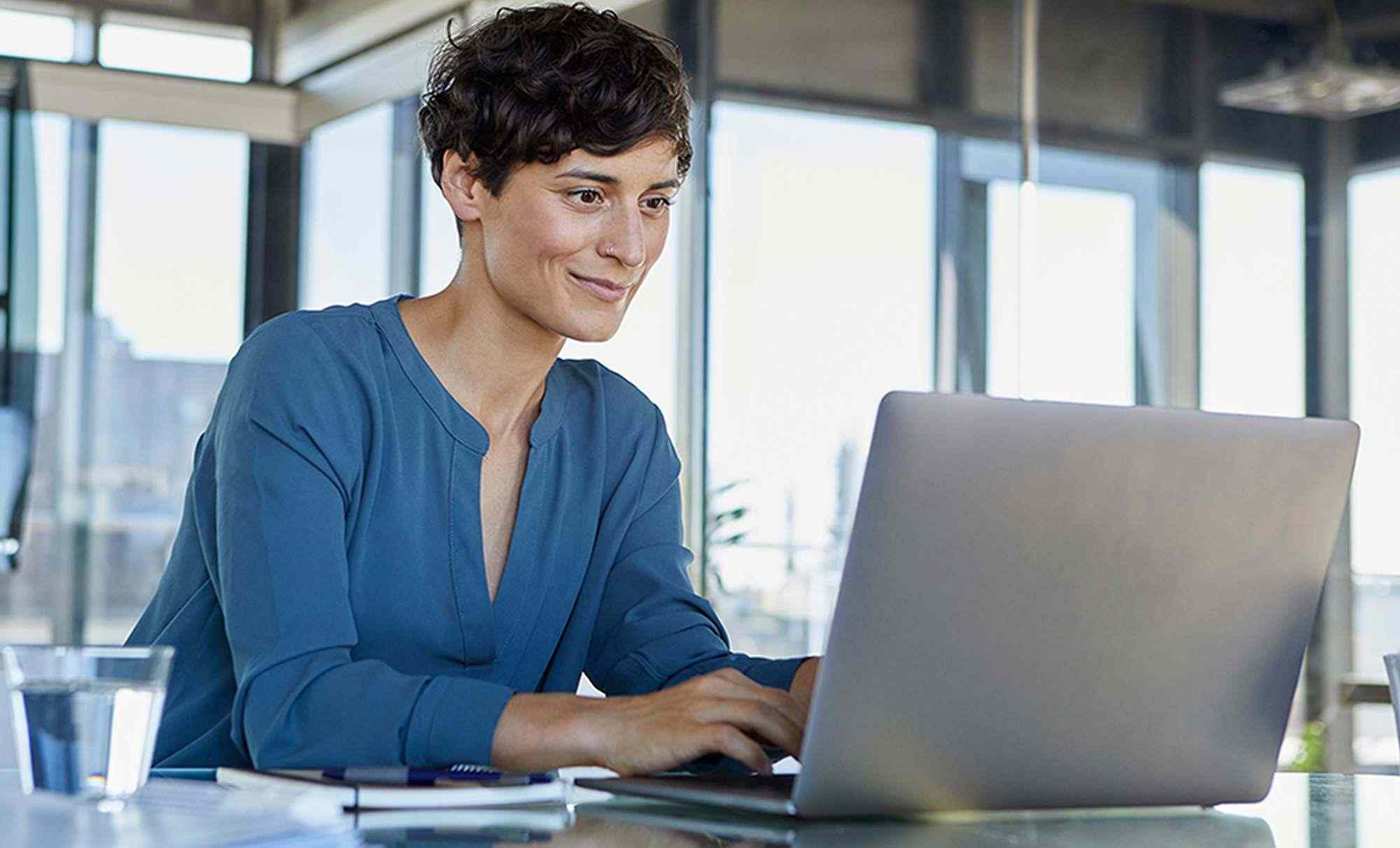 Woman in front of laptop