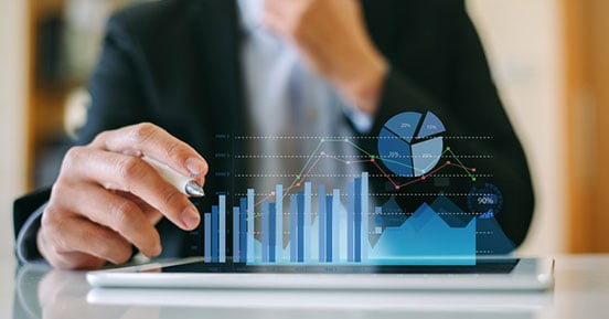 SunGard Availability Services- Concept of a person looking at graphs