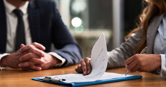 Application Solutions: Contracts- People reviewing files