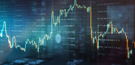A vibrant financial stock market graph with multiple lines and charts displayed on a screen