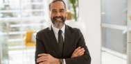 a businessman standing confidently
