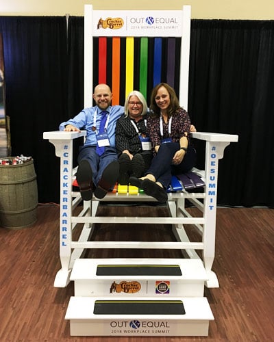 Iron Mountain Presents at the Out & Equal Conference- Three people on a chair