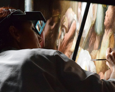 Artist painting mural
