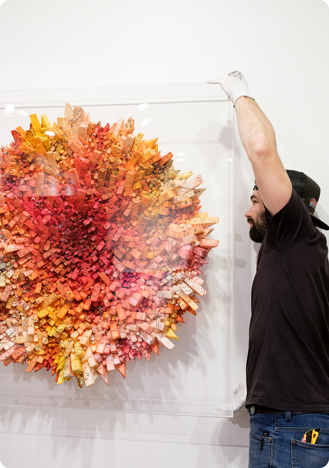 Technician installing painting