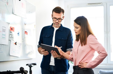 Employees helping each other
