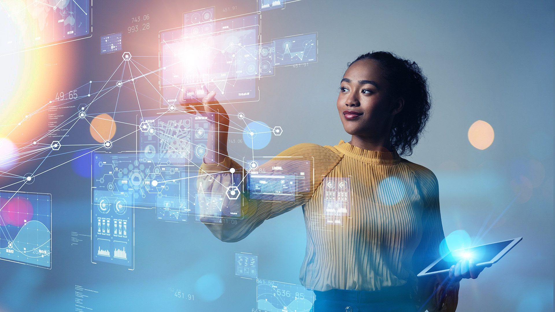 woman holding tablet, with overlay of blue and orange flares, blue computer nodes, looking forward