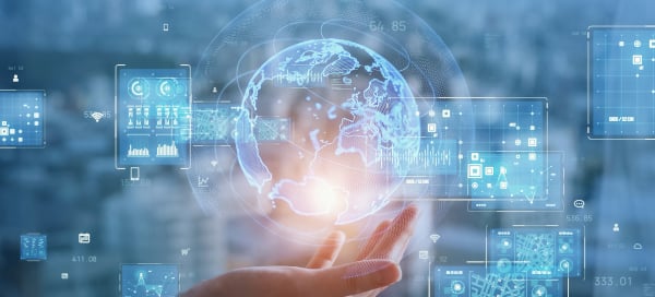 Hand holding digital globe