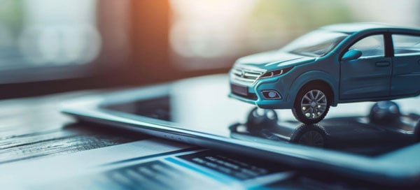 Toy car on a tablet