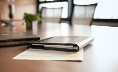 Document binder on a desk