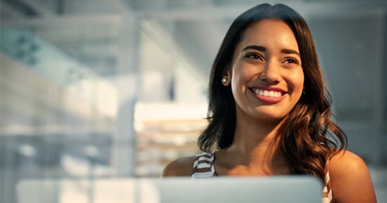 Top 10 Reasons to Backup Microsoft 365 Data - Smiling woman