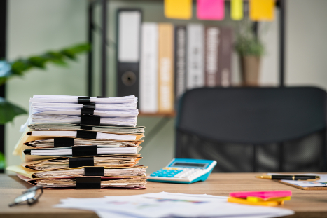 Paper files unsecure standing on desks