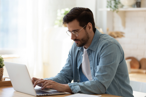 man working on laptop