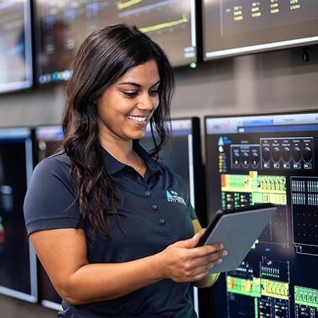 Data Centers employee on a tablet