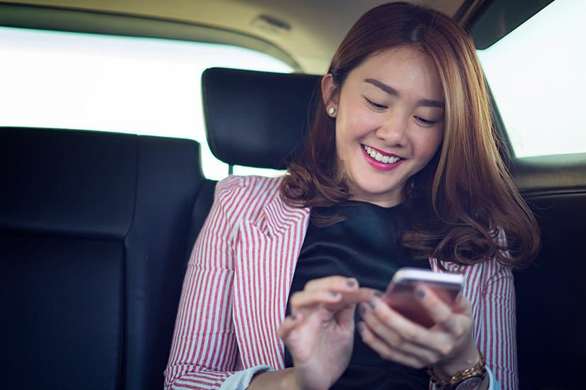 woman using her phone
