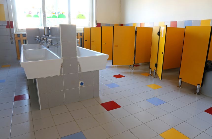 Gender neutral toilets in primary school breached regulations and indirectly discriminated against girls
