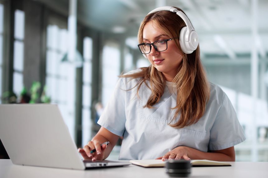 Does an employer have to provide equipment as a reasonable adjustment if the employee already has it at home?