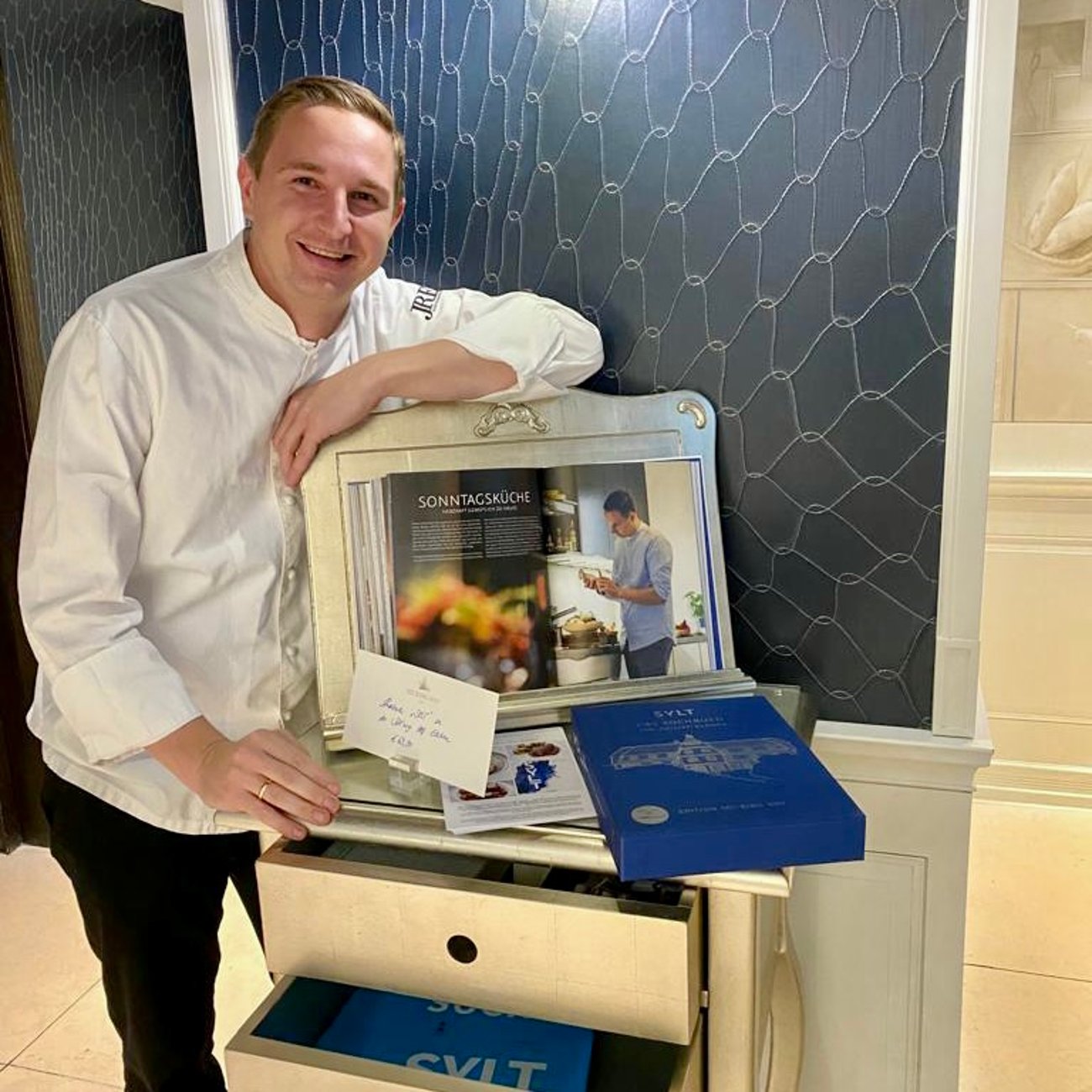 Jan-Philipp Berner with his book, JRE