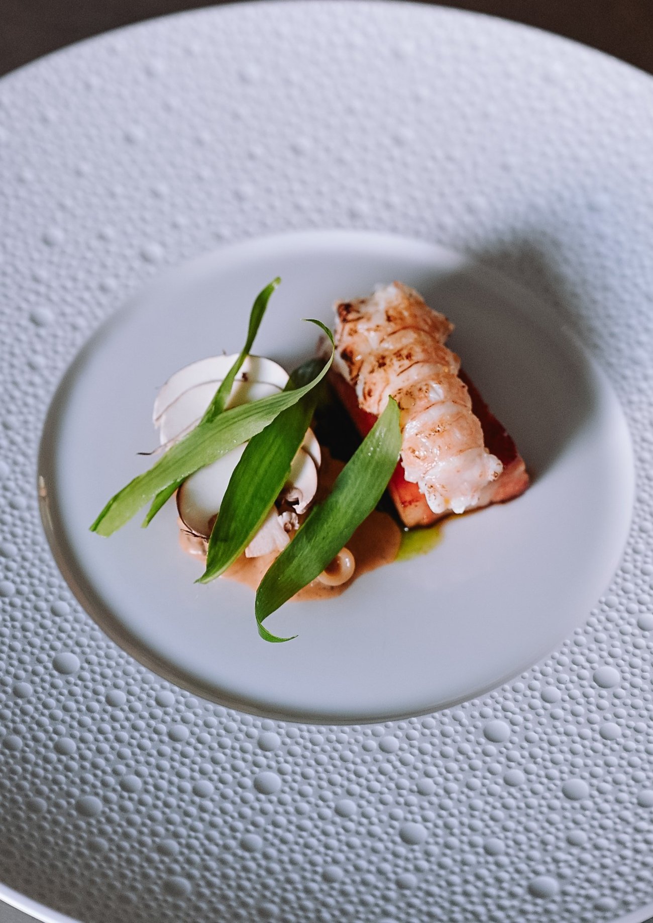 Gelakt Breydelspek met gebrande langouistine Anell